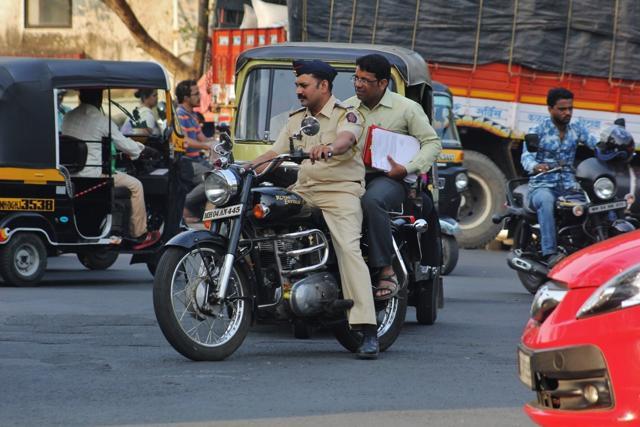 A constable spotted riding without a helmet in Thane. (Praful Gangurde)