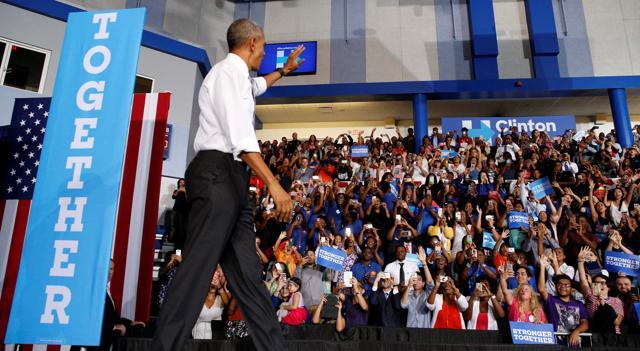 US President Barack Obama has been rallying for Democratic party nominee Hillary Clinton and acknowledged that he wants an overwhelming victory for her . (Reuters) US President Barack Obama has been rallying for Democratic party nominee Hillary Clinton and acknowledged that he wants an overwhelming victory for her . (Reuters)