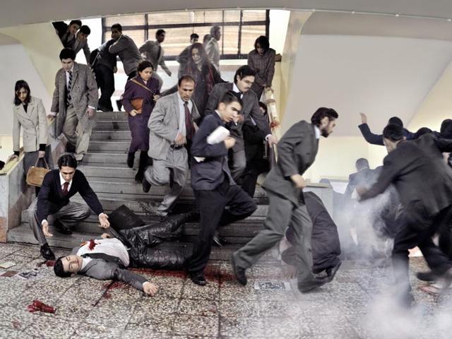 Iranian filmmaker and photographer Azadeh Akhlaghi has taken up staged photography to recreate Iranian assassinations.