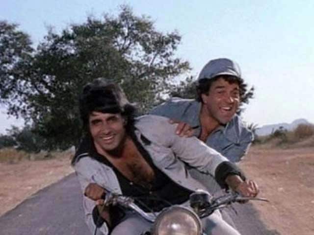 Amitabh Bachchan and Dharmendra in a scene from Sholay. Amitabh Bachchan and Dharmendra in a scene from Sholay.