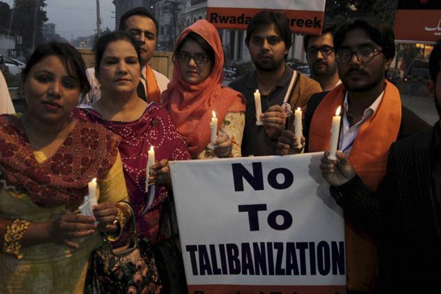 People attend a candlelight vigil for the victims of an overnight attack on the Quetta Police Training Academy, in Lahore, Pakistan. (AP Photo) People attend a candlelight vigil for the victims of an overnight attack on the Quetta Police Training Academy, in Lahore, Pakistan. (AP Photo)