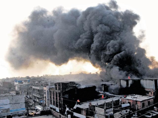 It took almost eight hours for 35 fire engines to douse flames in two plastic factories worth over Rs 1 crore in Hanumanganj area on Monday. (Mujeeb Faruqui/HT photo) It took almost eight hours for 35 fire engines to douse flames in two plastic factories worth over Rs 1 crore in Hanumanganj area on Monday. (Mujeeb Faruqui/HT photo)