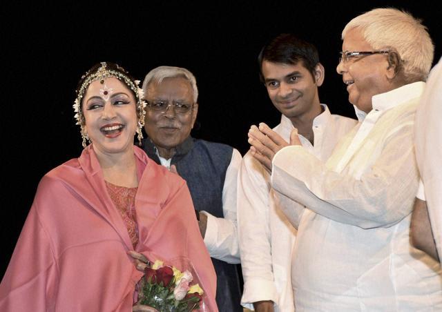 RJD chief Lalu Prasad with Hema Malini at a function in Patna on Tuesday. (PTI) RJD chief Lalu Prasad with Hema Malini at a function in Patna on Tuesday. (PTI)