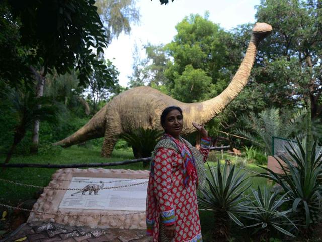 Nature educator Kusum Suthar gesturing as she speaks at the dinosaur park. (AFP)