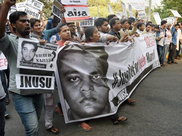 Members of JNUSU and other students' organisations shout slogans during a protest march over missing of student Najeeb Ahmed, in New Delhi on Monday. (PTI) Members of JNUSU and other students' organisations shout slogans during a protest march over missing of student Najeeb Ahmed, in New Delhi on Monday. (PTI)