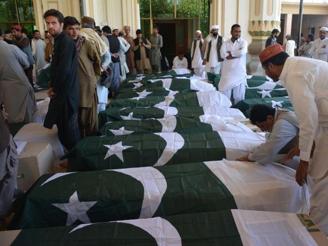 Pakistani mourners gather around the coffins of some of those killed in an attack on the Police Training College Balochistan in Quetta. (AFP Photo) Pakistani mourners gather around the coffins of some of those killed in an attack on the Police Training College Balochistan in Quetta. (AFP Photo)