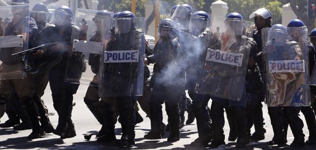 South African Police fire rubber bullets during a protest outside parliament in Cape Town, South Africa, Wednesday, Oct. 26, 2016. (AP) South African Police fire rubber bullets during a protest outside parliament in Cape Town, South Africa, Wednesday, Oct. 26, 2016. (AP)