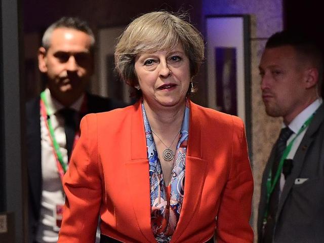 British Prime Minister Theresa May looks on as she leaves the European Union leaders summit in Brussels. (AFP Photo) British Prime Minister Theresa May looks on as she leaves the European Union leaders summit in Brussels. (AFP Photo)