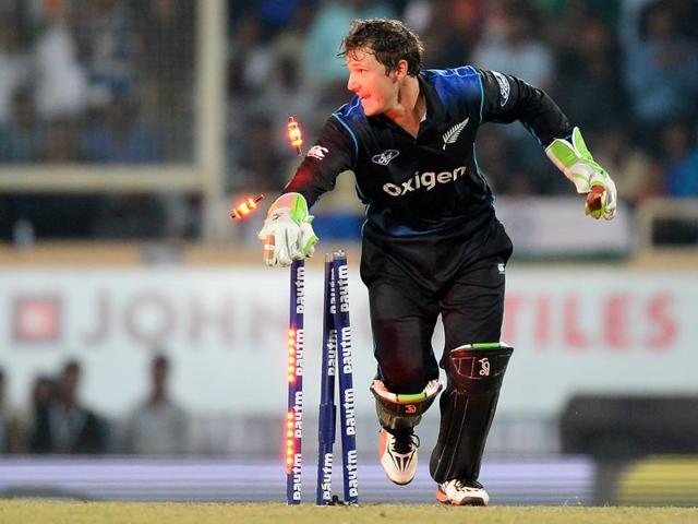 New Zealand's wicketkeeper BJ Watling runs outs India's Amit Mishra. (AFP)