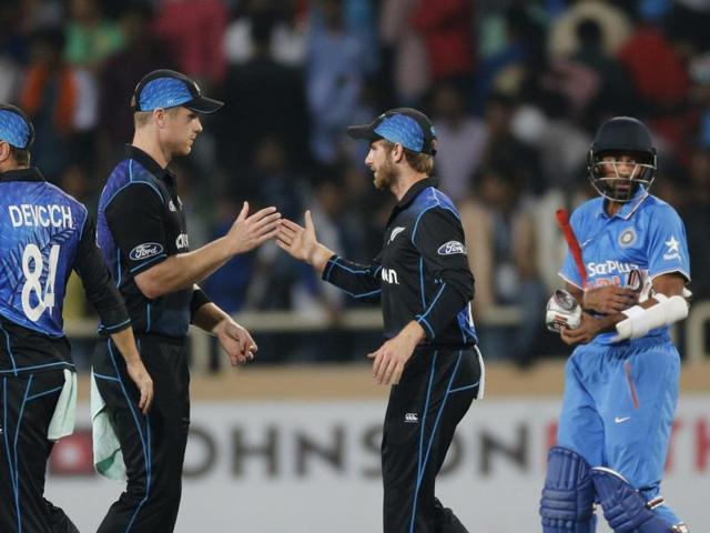 New Zealand's James Neesham, second left, and Kane Williamson celebrate their team's victory over India in the fourth one-day international in on October 26, 2016. (AP)