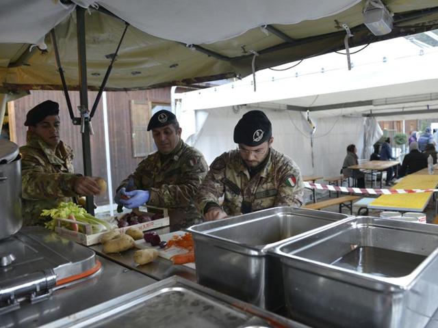 Soldiers prepare meals for residents of the village of Visso, Italy, Thursday, Oct 27, 2016 after a 5.9 earthquake destroyed part of the town. (AP) Soldiers prepare meals for residents of the village of Visso, Italy, Thursday, Oct 27, 2016 after a 5.9 earthquake destroyed part of the town. (AP)