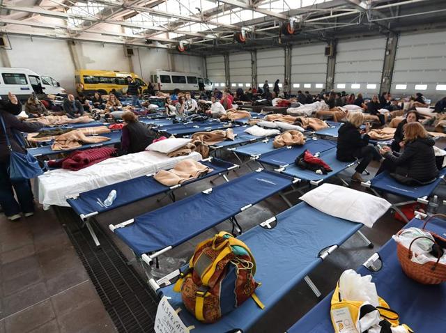 People rest on camp beds in an accommodation centre for the victims of the earthquake that hit the area of Macerata, Visso and Ussita, in Camerino, central Italy. (AFP) People rest on camp beds in an accommodation centre for the victims of the earthquake that hit the area of Macerata, Visso and Ussita, in Camerino, central Italy. (AFP)