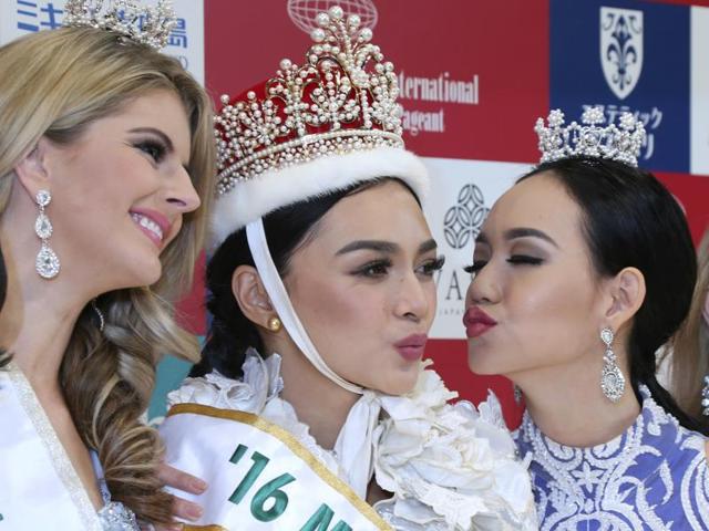 Kylie Verzosa, center, is congratulated by first runner-up Miss Australia Alexandra Britton, left, and second runner-up Miss Indonesia Felicia Hwang after being crowned 2016 Miss International. (AP) Kylie Verzosa, center, is congratulated by first runner-up Miss Australia Alexandra Britton, left, and second runner-up Miss Indonesia Felicia Hwang after being crowned 2016 Miss International. (AP)