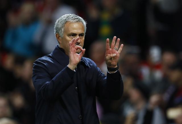 Mourinho makes a sign referring to 4-0, the score in United’s loss to Chelsea. (REUTERS) Mourinho makes a sign referring to 4-0, the score in United’s loss to Chelsea. (REUTERS)