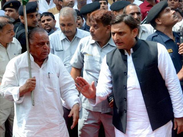 Samajwadi Party supremo Mulayam Singh Yadav and Uttar Pradesh chief minister Akhilesh Yadav at the party office in Lucknow.(PTI File Photo)