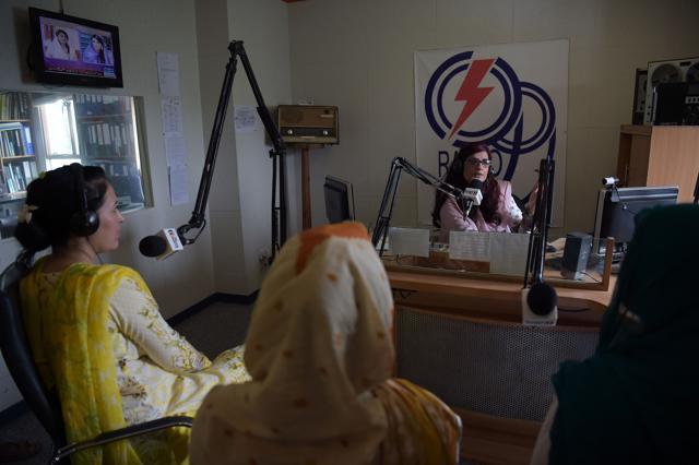 Anila Ansari (right), a programme manager at Islamabad-based Power 99 FM radio, presents an on air "anti-ogling campaign" with her colleagues. (AFP) Anila Ansari (right), a programme manager at Islamabad-based Power 99 FM radio, presents an on air "anti-ogling campaign" with her colleagues. (AFP)