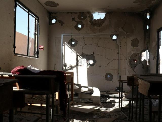A damaged classroom is pictured after shelling in the rebel held town of Hass, south of Idlib province, Syria. (Reuters Photo) A damaged classroom is pictured after shelling in the rebel held town of Hass, south of Idlib province, Syria. (Reuters Photo)