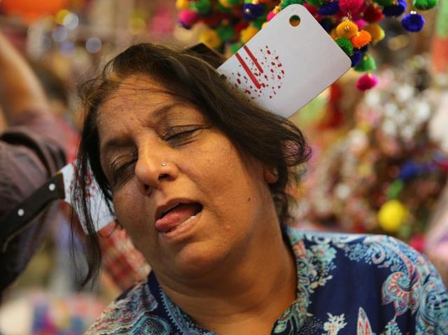 The cleaver hairband priced at Rs 90 is a budget-friendly option if you want to look like you were hacked to death.  (Prabhas Roy/HT Photo) 