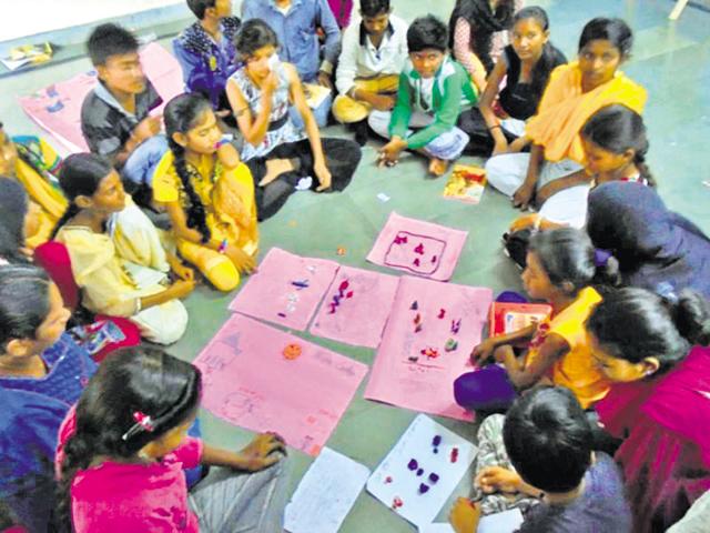 Children attend a story-telling session at a resource centre of Eka, an NGO, in Bhopal. (HT photo) Children attend a story-telling session at a resource centre of Eka, an NGO, in Bhopal. (HT photo)