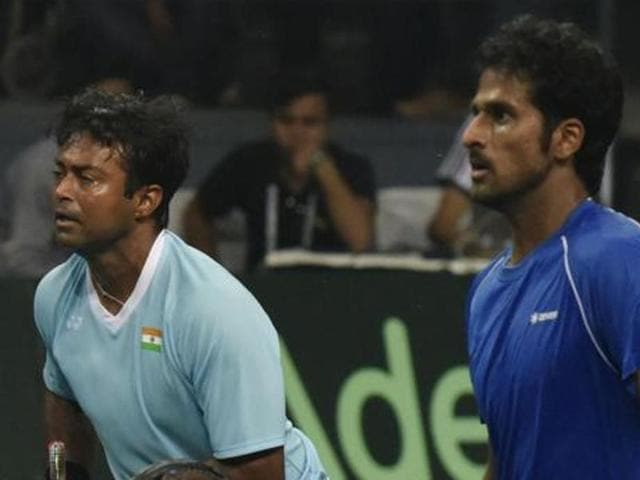 India's Leander Paes, left, celebrates a point with teammate Saketh Myneni during the Davis Cup world group play-off against Spain. (AP Photo) India's Leander Paes, left, celebrates a point with teammate Saketh Myneni during the Davis Cup world group play-off against Spain. (AP Photo)