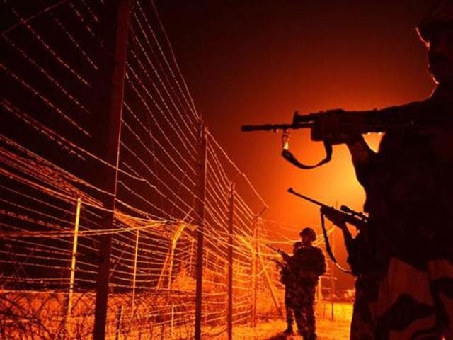 In this file photograph, BSF soldiers patrol along a border fence at an outpost along the Line of Control (LOC) between India-Pakistan at Abdulian, some 38 kms southwest of Jammu. (AFP File Photo) In this file photograph, BSF soldiers patrol along a border fence at an outpost along the Line of Control (LOC) between India-Pakistan at Abdulian, some 38 kms southwest of Jammu. (AFP File Photo)