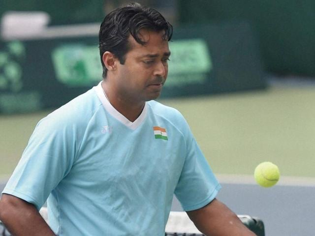 Paes and Ramkumar did well until midway through the second set, before momentum shifted and the yougner Indian’s inexperience showed in the match tiebreak.(Sanjeev Sharma/HT Photo) Paes and Ramkumar did well until midway through the second set, before momentum shifted and the yougner Indian’s inexperience showed in the match tiebreak.(Sanjeev Sharma/HT Photo)