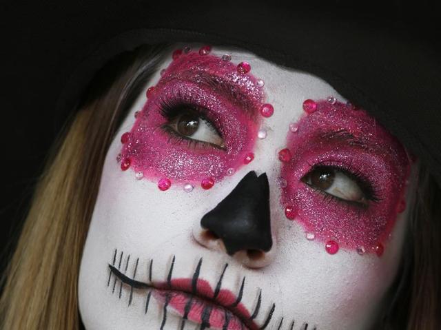 A woman with a face full of macabre make up participates in Day of the Dead festivities in Mexico City on Thursday, October 27, 2016. (AP) A woman with a face full of macabre make up participates in Day of the Dead festivities in Mexico City on Thursday, October 27, 2016. (AP)