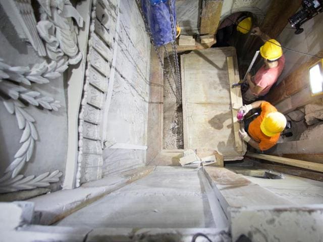 A restoration team has peeled away a marble layer for the first time in centuries in an effort to reach what it believes is the original rock surface where Jesus' body was laid. (AP Photo) A restoration team has peeled away a marble layer for the first time in centuries in an effort to reach what it believes is the original rock surface where Jesus' body was laid. (AP Photo)