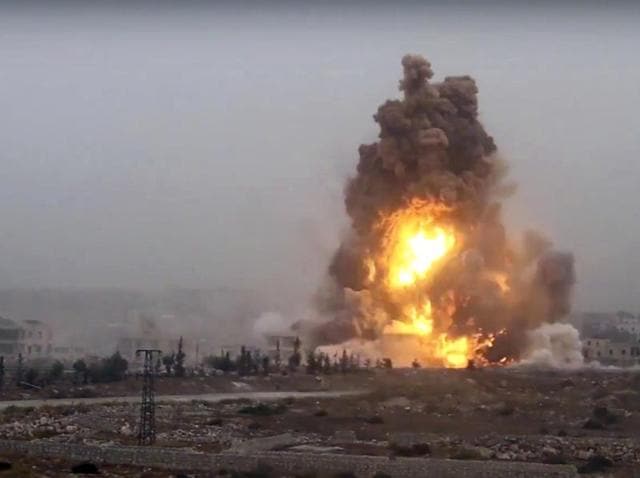 This frame grab from video provided by Thiqa news agency, a Syrian opposition media outlet, shows flames rises from an explosive vehicle bomb that attacked a Syrian government position in southwestern Aleppo. (AP) This frame grab from video provided by Thiqa news agency, a Syrian opposition media outlet, shows flames rises from an explosive vehicle bomb that attacked a Syrian government position in southwestern Aleppo. (AP)