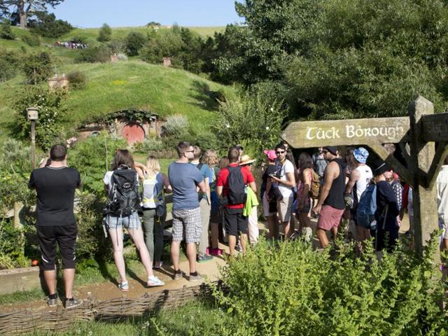 In this photo, tourists tour the Hobbit movie set near Matamata, New Zealand. (AP) In this photo, tourists tour the Hobbit movie set near Matamata, New Zealand. (AP)