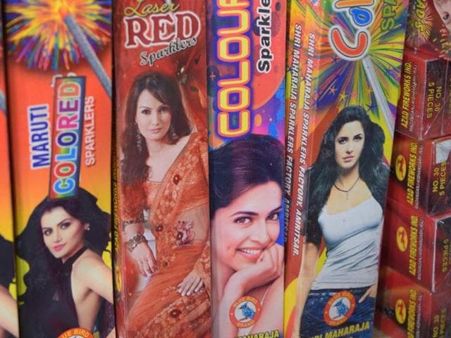 Fire-cracker manufacturers have put up photographs of Bollywood celebrities on their packets to attract customers. Packets sporting pictures of Deepika Padukone are a hit. (Ravi Kumar/HT) Fire-cracker manufacturers have put up photographs of Bollywood celebrities on their packets to attract customers. Packets sporting pictures of Deepika Padukone are a hit. (Ravi Kumar/HT)