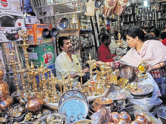Women buy utensils at a Bhopal shop on the occasion of Dhanteras on Friday. (Praveen Bajpai/HT Photo) Women buy utensils at a Bhopal shop on the occasion of Dhanteras on Friday. (Praveen Bajpai/HT Photo)