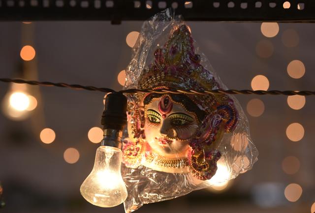 A Lakshmi idol on sale at Bengali Market in New Delhi on the occasion of Dhanteras. (Ravi Choudhary/HT Photo)