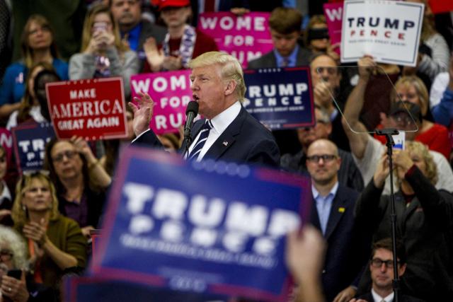 Republican presidential candidate Donald Trump said in Hampshire, “Hillary Clinton’s corruption is on a scale we have never seen before... We must not let her take her criminal scheme into the Oval Office.” (AFP) Republican presidential candidate Donald Trump said in Hampshire, “Hillary Clinton’s corruption is on a scale we have never seen before... We must not let her take her criminal scheme into the Oval Office.” (AFP)