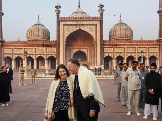 New Zealand PM John Key and his wife share a light moment at the Jama Masjid in New Delhi. (PTI Photo)