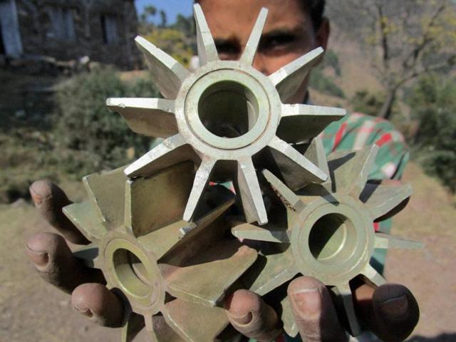 A villager showing remains of mortar shells fired from across the LOC by Pakistan at a village Mankot Poonch district in Jammu on Saturday, Oct 29, 2016. (PTI) A villager showing remains of mortar shells fired from across the LOC by Pakistan at a village Mankot Poonch district in Jammu on Saturday, Oct 29, 2016. (PTI)