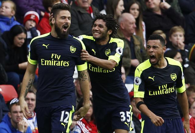 Arsenal's Olivier Giroud celebrates scoring their second goal with Francis Coquelin and Mohamed Elneny. (REUTERS) Arsenal's Olivier Giroud celebrates scoring their second goal with Francis Coquelin and Mohamed Elneny. (REUTERS)