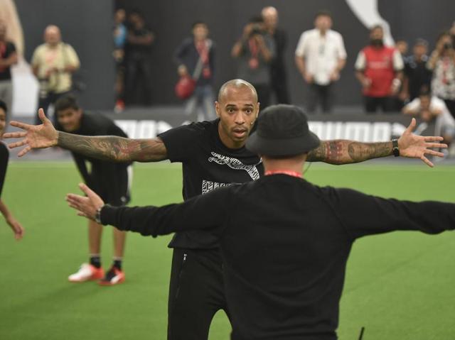 Legendary French footballer Thierry Henry shares a light moment during a brand promotion at NSCI stadium in Mumbai. (Arijit Sen/HT Photo)