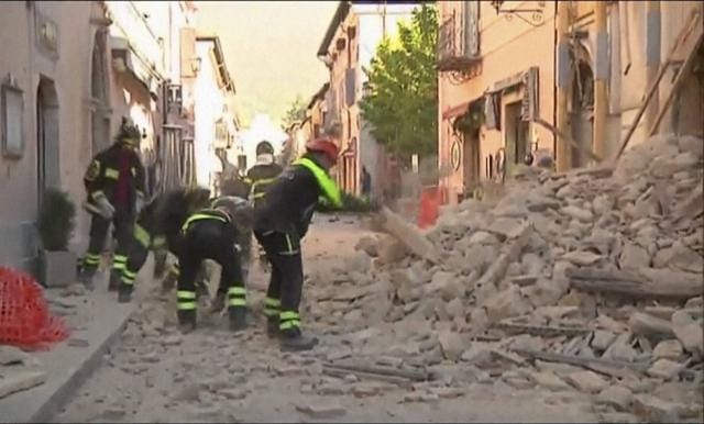 In this image made from video, firefighters clean rubbles fallen from a damaged building in Norcia, Italy. (SkyItalia via AP) In this image made from video, firefighters clean rubbles fallen from a damaged building in Norcia, Italy. (SkyItalia via AP)