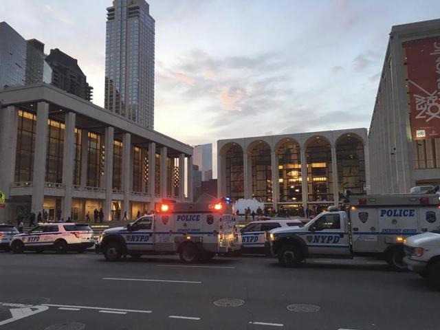 Police respond to New York's Metropolitan Opera that had halted a performance after someone sprinkled an unknown powder into the orchestra pit. (AP Photo) Police respond to New York's Metropolitan Opera that had halted a performance after someone sprinkled an unknown powder into the orchestra pit. (AP Photo)