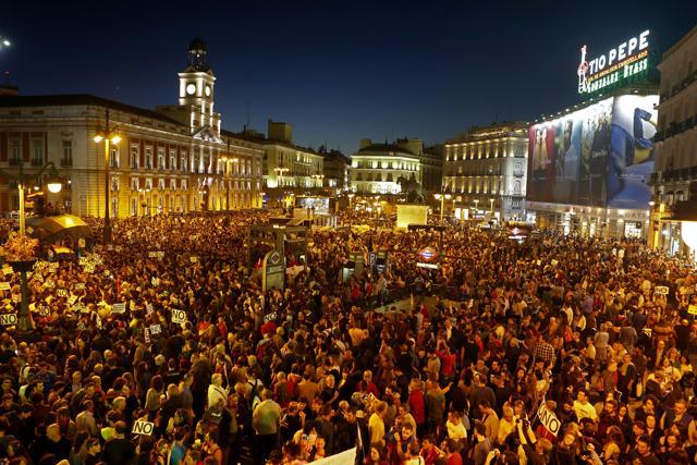 Some thousands arrive to Sol square after marching during a demonstration against Spain's acting Prime Minister Mariano Rajoy. (AP Photo) Some thousands arrive to Sol square after marching during a demonstration against Spain's acting Prime Minister Mariano Rajoy. (AP Photo)