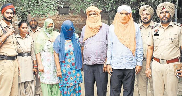 The accused in police custody in Ludhiana on Thursday. (HT Photo) The accused in police custody in Ludhiana on Thursday. (HT Photo)
