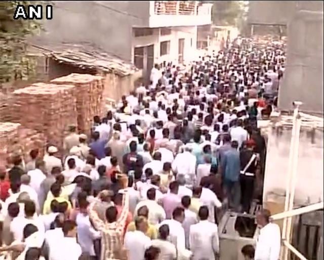 Thousands gather as mortal remains of Mandeep Singh (who lost his life in Machil encounter) reach his hometown. (Photo courtesy: ANI) Thousands gather as mortal remains of Mandeep Singh (who lost his life in Machil encounter) reach his hometown. (Photo courtesy: ANI)