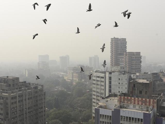 A view of air pollution the morning after  Diwali, in Connaught place area of New Delhi. (Sonu Mehta/HT Photo) 
