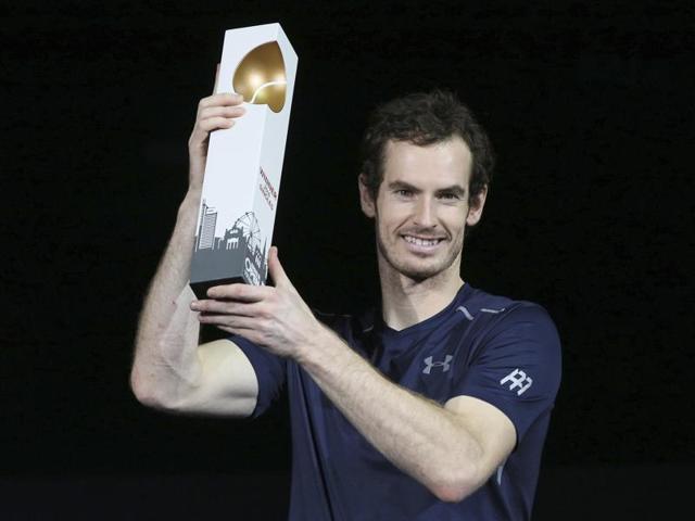 Murray poses with the trophy amidst a shower of confetti during the post-match presentation ceremony. (AP) Murray poses with the trophy amidst a shower of confetti during the post-match presentation ceremony. (AP)