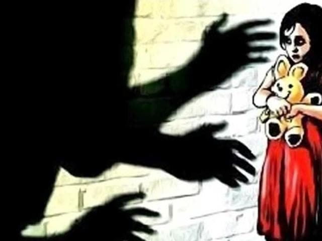 While the girl was engrossed in watching TV, the woman came from behind and caught the her hands, while her husband allegedly raped her