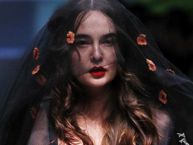 A model presents a lingerie collection by Aimer during the Mercedes-Benz China Fashion Week in Beijing on Sunday. (AP)
