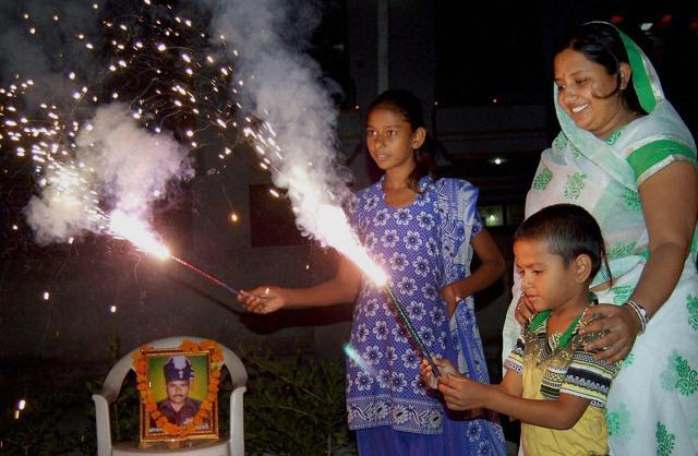 Uri attack martyr Nimb Singh's family celebrating Diwali in Beawar on Saturday. (PTI Photo) Uri attack martyr Nimb Singh's family celebrating Diwali in Beawar on Saturday. (PTI Photo)