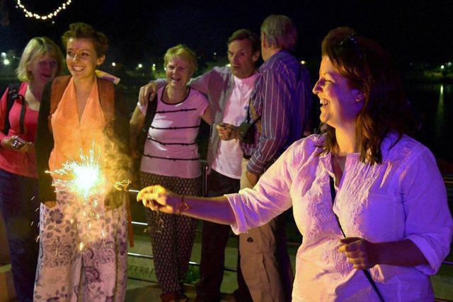 Foreign tourists celebrate Diwali in Pushkar on Sunday. (PTI Photo) Foreign tourists celebrate Diwali in Pushkar on Sunday. (PTI Photo)