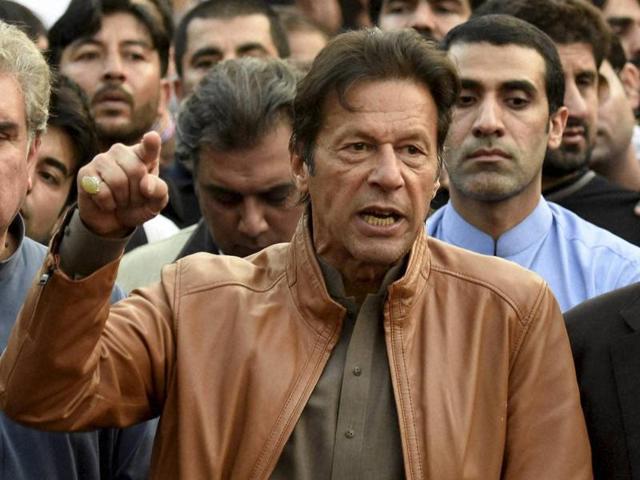 Imran Khan, Pakistan's cricketer-turned-politician addresses his supporters outsiders residence in Islamabad, Pakistan. (AP File Photo) Imran Khan, Pakistan's cricketer-turned-politician addresses his supporters outsiders residence in Islamabad, Pakistan. (AP File Photo)